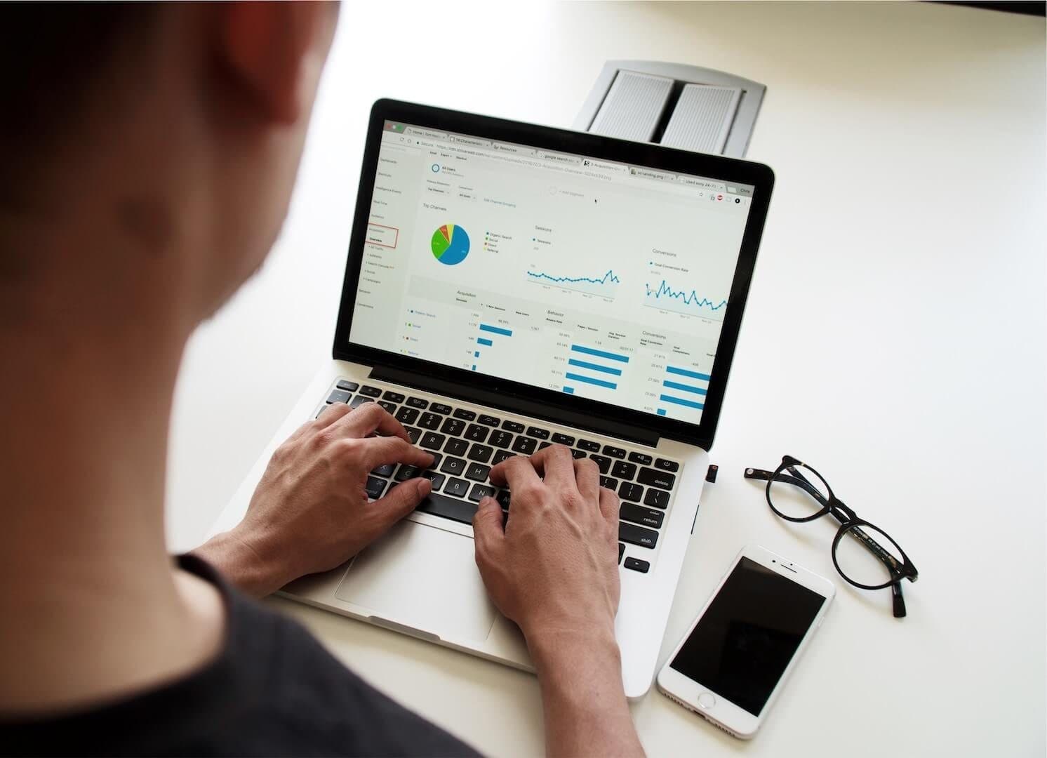 A marketing team working through campaign performance on screen